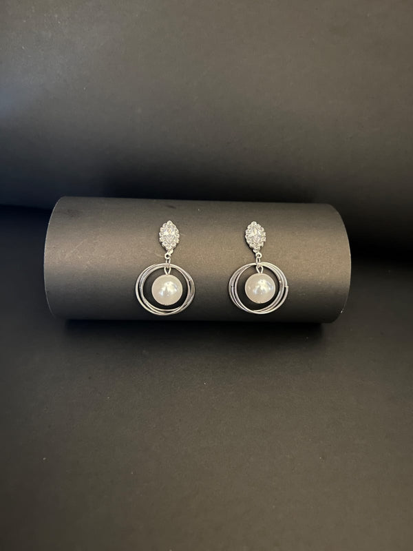 Elegant Earrings with Pearls